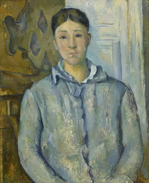 Paul Cézanne – Madame Cézanne in azzurro. Donna con giacca azzurra e colletto bianco davanti a una parete oliva con motivi a goccia azzurri e un chiaro rivestimento, Paul Cézanne, 1886-1887, riproduzione dipinta a mano