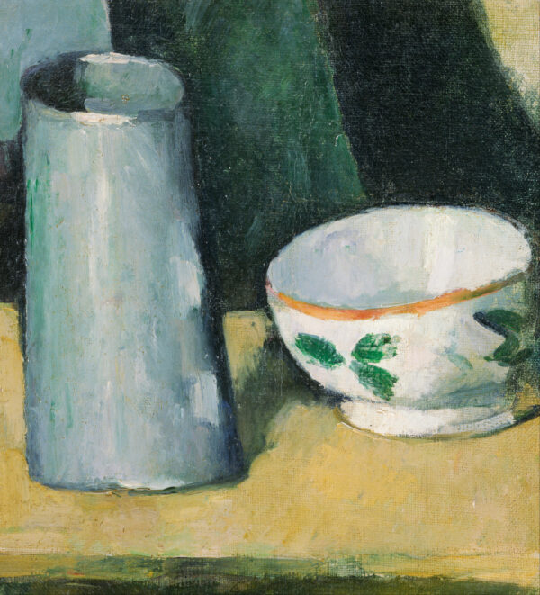 A white bowl with an orange rim and green leaf sprigs beside a blue-grey milk pot on an ochre surface, Paul Cézanne